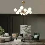 Thalassia Two-Tier Brass Opal Globe Chandelier Thalassia Two-Tier Brass Opal Globe Chandelier