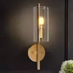 Aldorix Bronze Seedy Glass Cylinder Wall Sconce