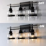 Nexith 3 Lights Black Iron Clear Glass Vanity Wall Sconce