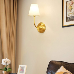 Ozwa Frosted Antique Brass Wall Sconce with Linen Shade