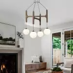 Astraea Farmhouse Wooden Branch Milk Glass Globe Chandelier
