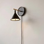 Anoushka Minimalist Black Cast Wall Sconce Anoushka Minimalist Black Cast Wall Sconce