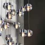 Ava Creative 12 Lights Globe Milk Glass Linear Chandelier Ava Creative 12 Lights Globe Milk Glass Linear Chandelier