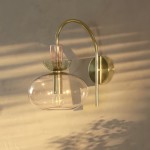 Oryn Globe Glass Brass Wall Light