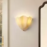 Kyrintha Mid-Century Modern Skirt Shell Glass Wall Sconce