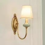 Drusilla Mid Century Modern Aged Brass Looped Arm Vanity Light