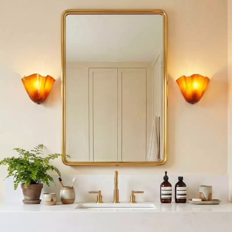 Kyrintha Mid-Century Modern Skirt Shell Glass Wall Sconce