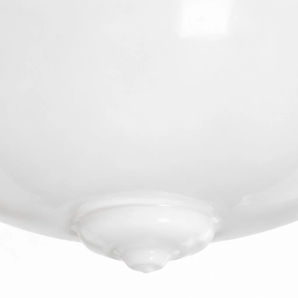 Rounded underside of the milk glass shade