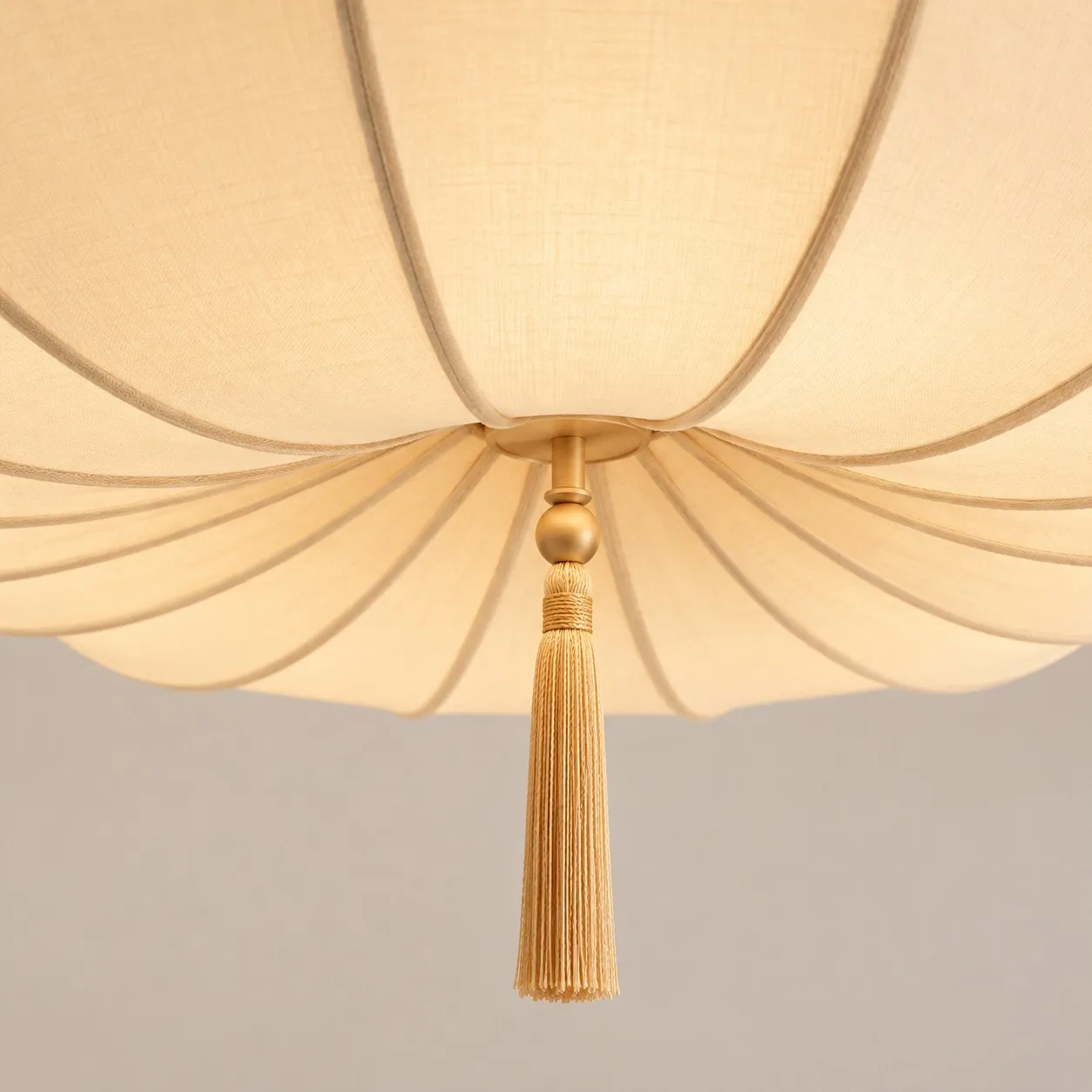 Underside of the pendant with decorative tassel