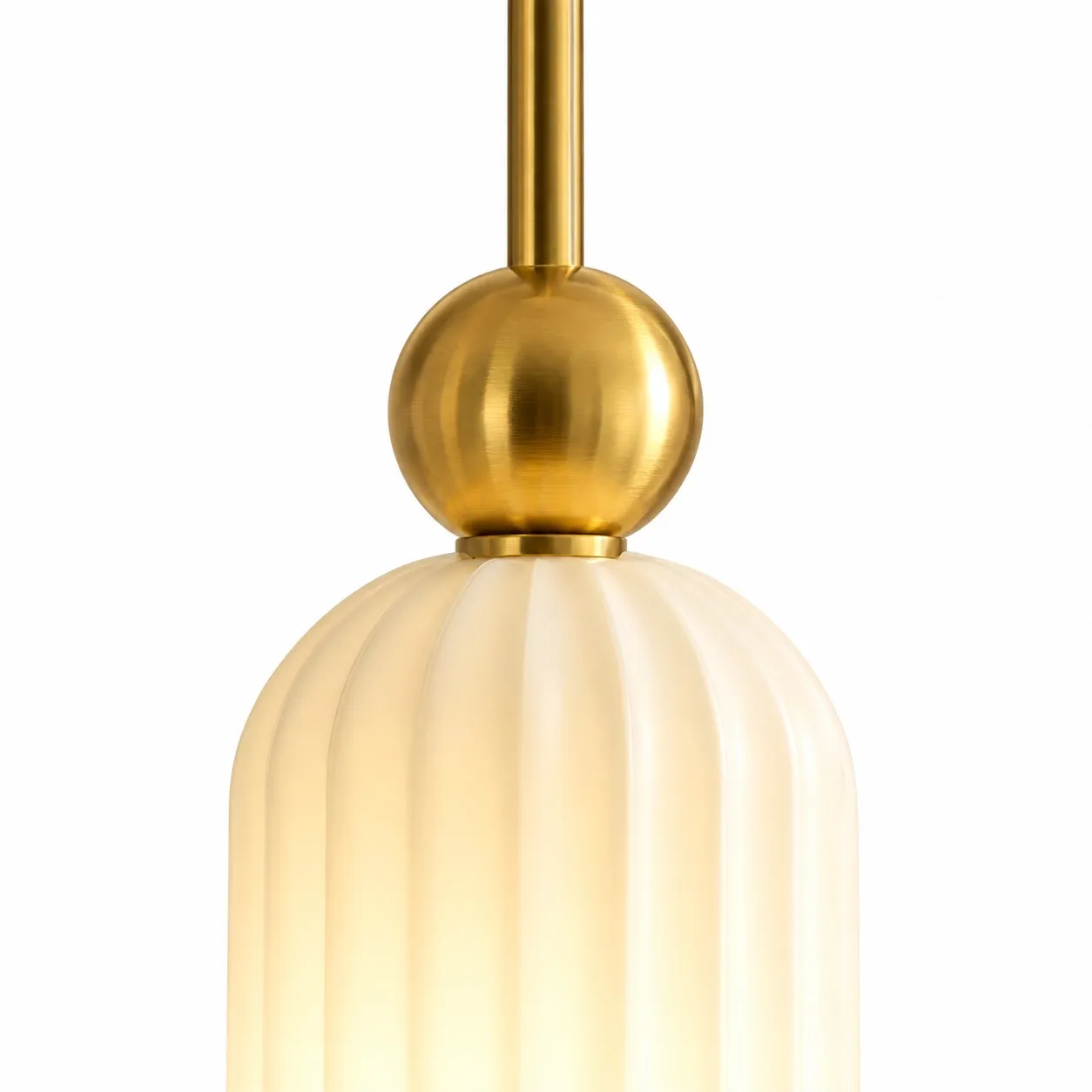 Spherical metal accent above the cylinder shade