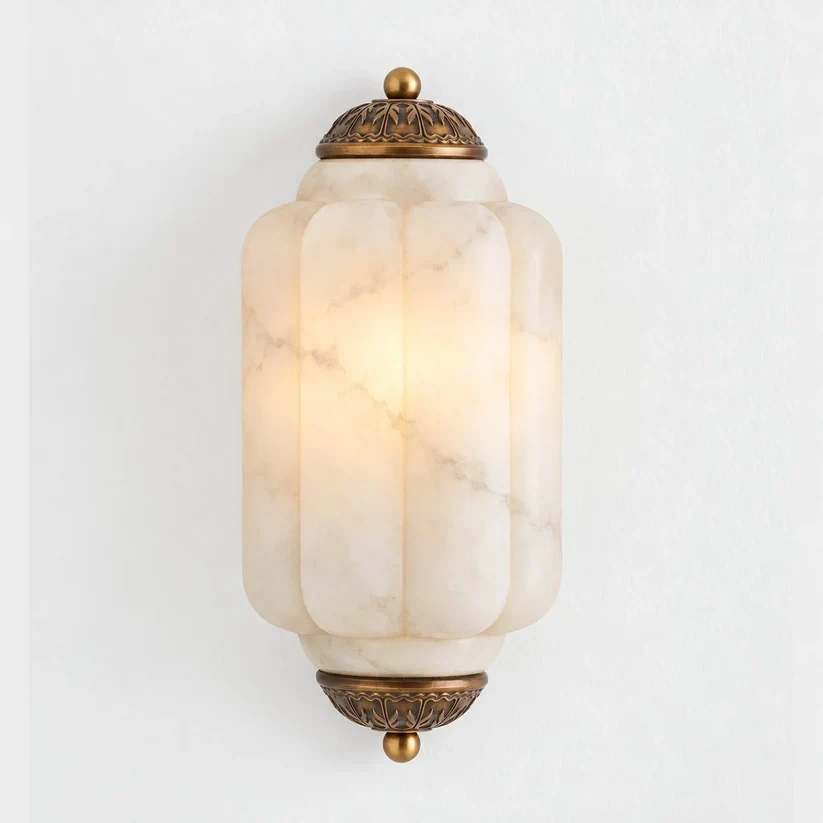 Eloise wall sconce with Brass finished decorative metalwork