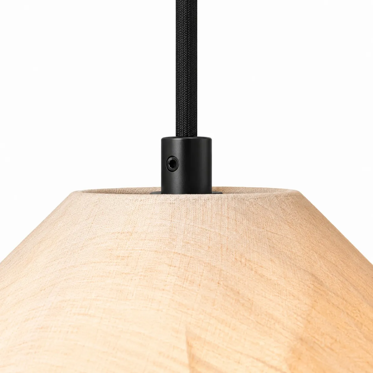Close-up of the black suspension connection and textured fabric