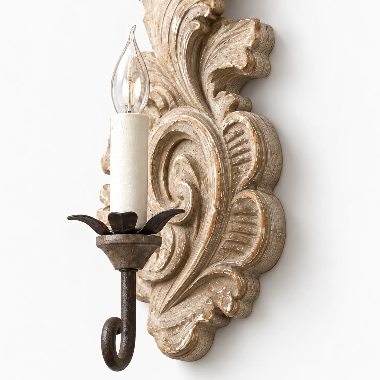 Detail · Carved Wood Backplate close-up of the wood and iron wall sconce