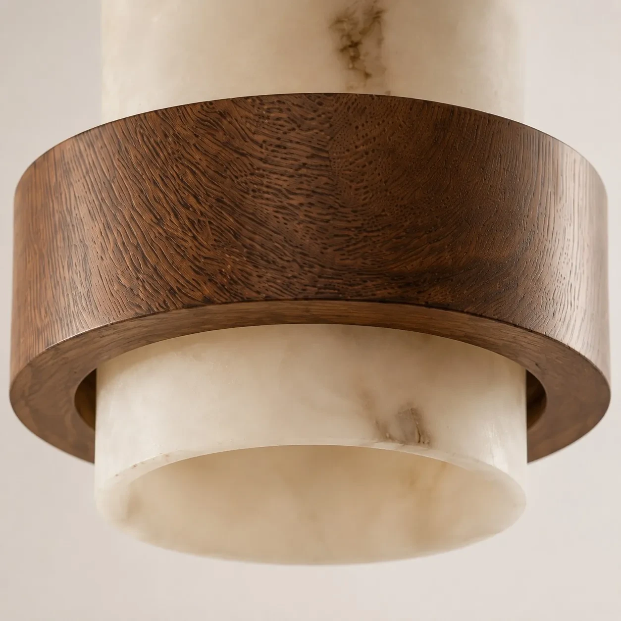 Dark wood band around an alabaster shade